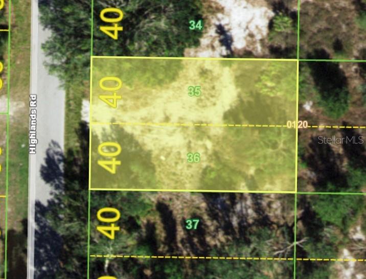 This map shows two adjacent rectangular land parcels labeled 35 and 36 along Highlands Road — 2090 HIGHLANDS ROAD, PUNTA GORDA, FL