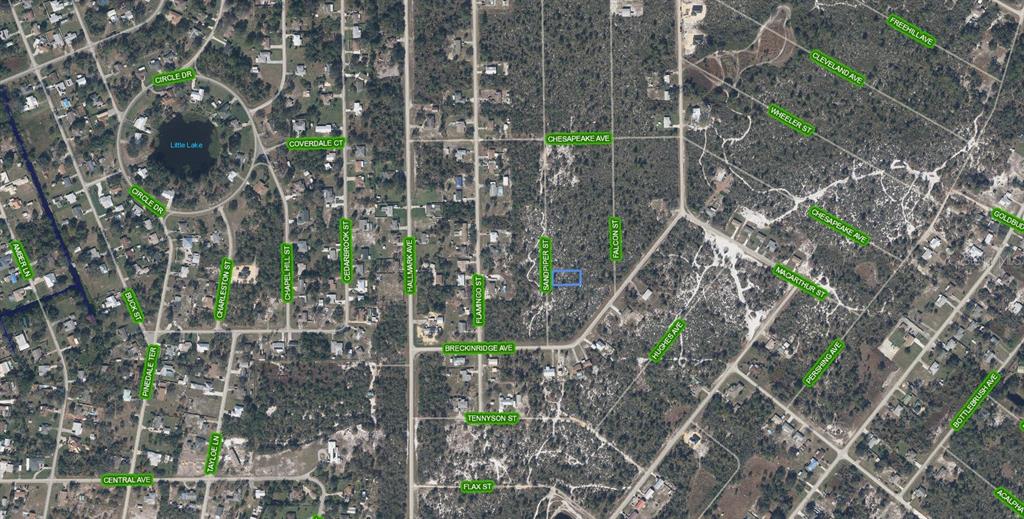 This is an aerial map view showing a highlighted residential lot in a wooded area — 239 SANDPIPER STREET, LAKE PLACID, FL