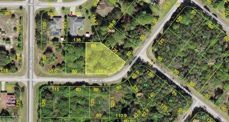 This is an aerial map showing a highlighted vacant lot located at a street intersection — 15028 CRESENT AVENUE, PORT CHARLOTTE, FL