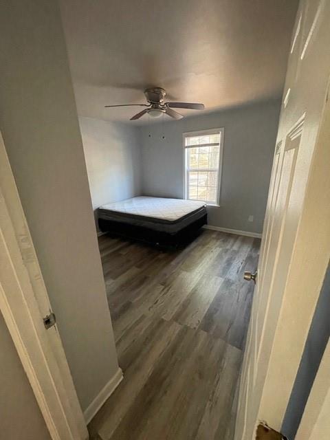 A bedroom with light gray walls, wood-look flooring, a ceiling fan, and a mattress — 2513 Colleen, Tallahassee FL 32303, TALLAHASSEE, FL