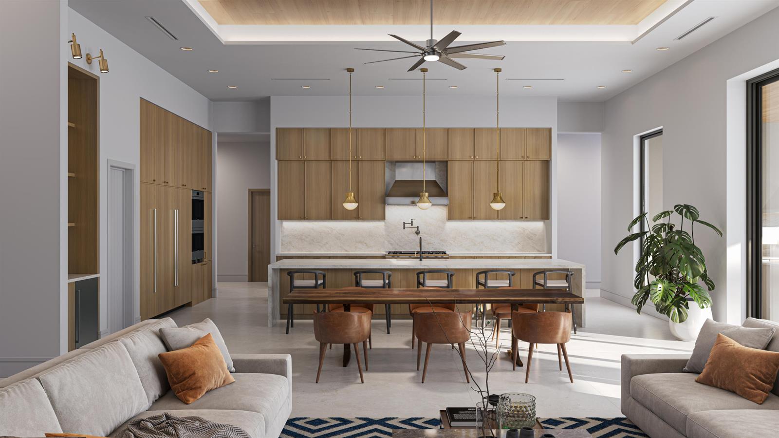 A modern kitchen features light wood cabinetry, a marble waterfall island, and gold pendant lights — 5593 Reynolds Road, Lake Worth FL 33449, LAKE WORTH, FL