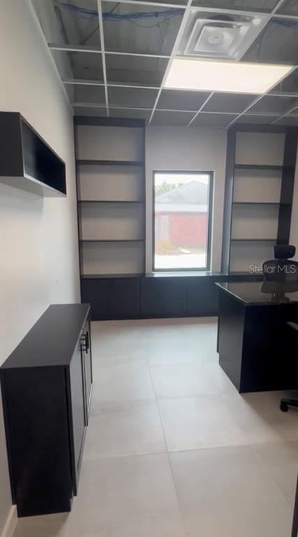 This floor plan shows a 267.5 square foot office unit with two desks and chairs — 4560 W IRLO BRONSON MEMORIAL HIGHWAY UNIT 203, KISSIMMEE, FL