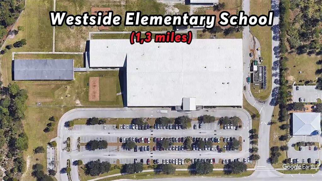 This aerial map view shows a school building with an adjacent parking lot and grounds — 196 SW HAINES ROAD, PALM BAY, FL
