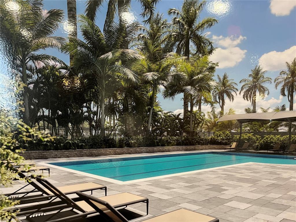 This rendering shows a rectangular swimming pool surrounded by lounge chairs and palm trees — 435 S GULFSTREAM AVENUE UNIT 206, SARASOTA, FL