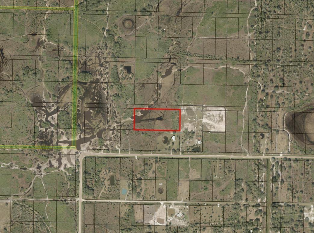 An aerial map view shows a rectangular property highlighted in red within a rural landscape — 0 NW 306th Street, Okeechobee FL 34972, OKEECHOBEE, FL