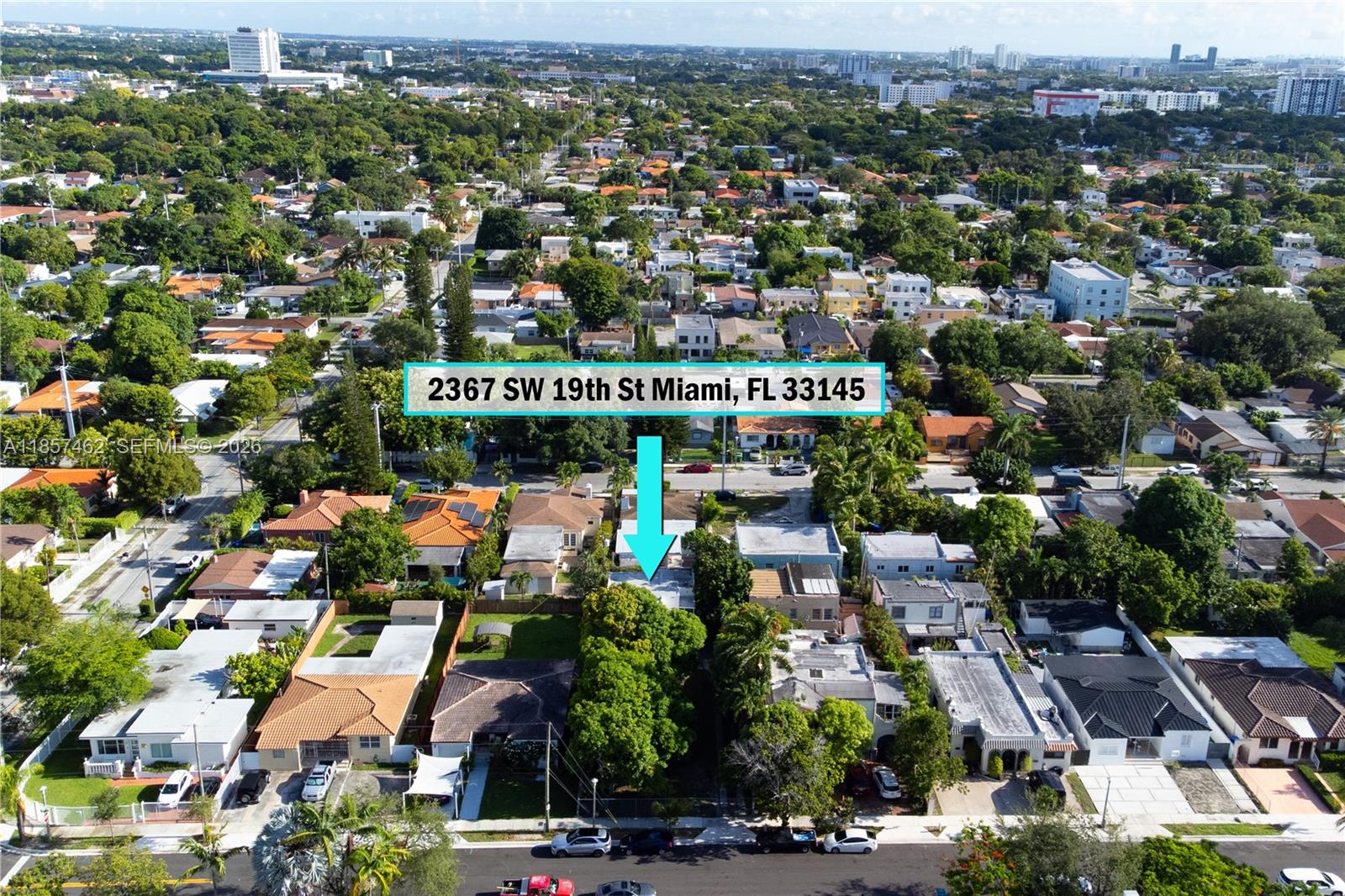 An aerial view shows a residential neighborhood with a house highlighted by a blue arrow — 2367 SW 19th St, Miami FL 33145, MIAMI, FL