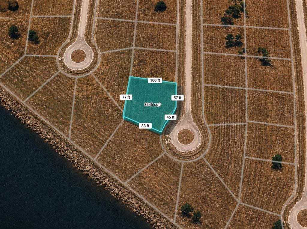 An aerial map view shows a highlighted vacant residential lot with its dimensions and square footage — 5 TEAK LANE, PLACIDA, FL