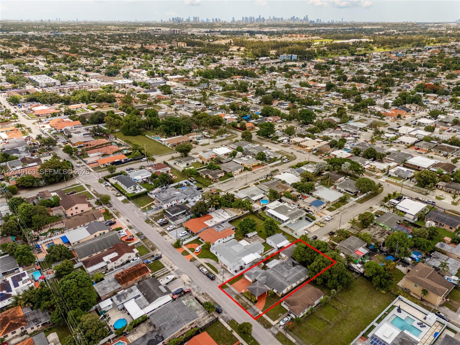 An aerial view shows a single-story house with a red-outlined property line — 292 W 39th Pl, Hialeah FL 33012, HIALEAH, FL