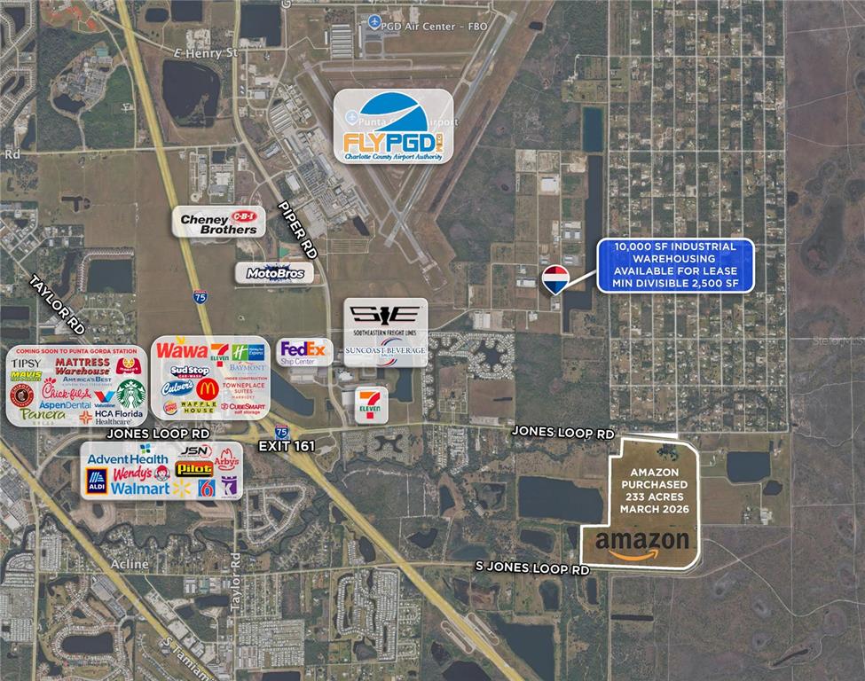 This is an aerial map showing commercial developments and industrial sites near an airport — 8429 NORTHUP DRIVE UNIT 4, PUNTA GORDA, FL