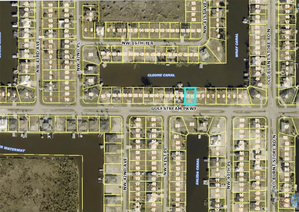 This is a satellite map showing residential lots along a canal and street — 4103 GULFSTREAM PARKWAY, CAPE CORAL, FL