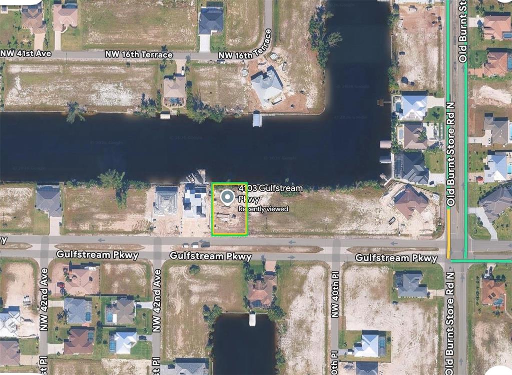 This is a satellite map view showing a vacant residential lot along a canal — 4103 GULFSTREAM PARKWAY, CAPE CORAL, FL