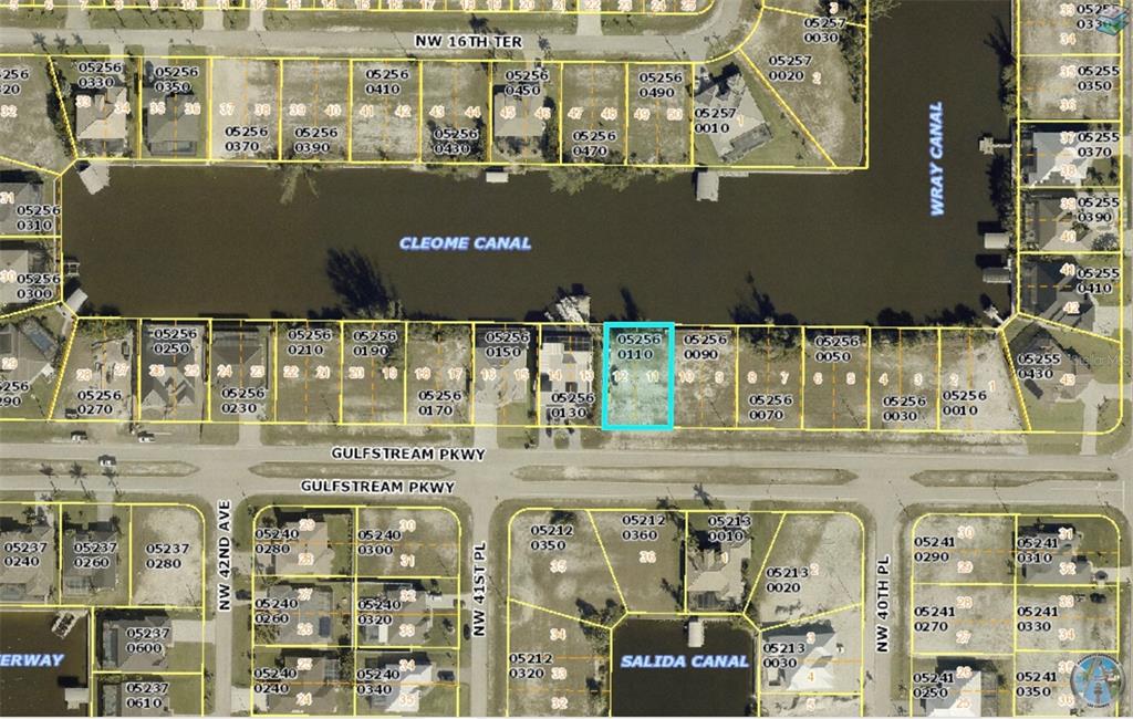 This is a satellite map showing residential lots along a canal — 4103 GULFSTREAM PARKWAY, CAPE CORAL, FL