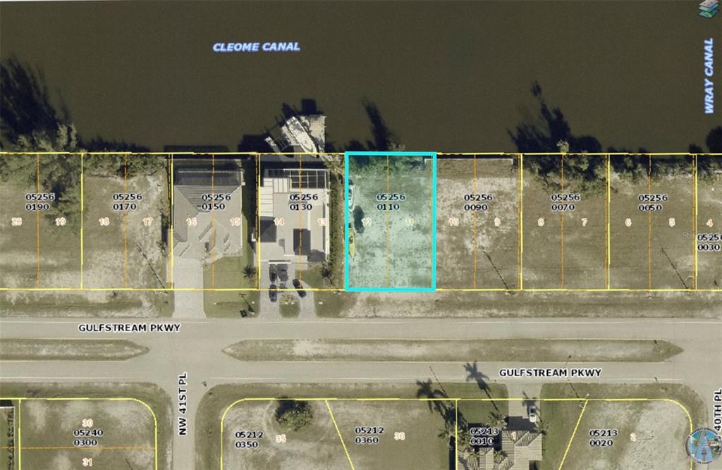 This is a map showing a vacant waterfront lot highlighted in blue along a canal — 4103 GULFSTREAM PARKWAY, CAPE CORAL, FL