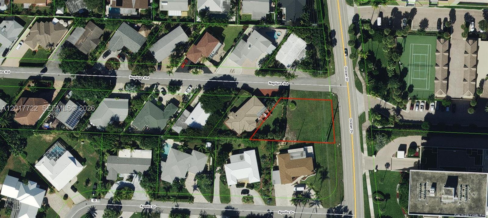 This aerial map shows a vacant residential lot outlined in red near a street intersection — xxxx Neptune Rd, Juno Beach FL 33408, JUNO BEACH, FL