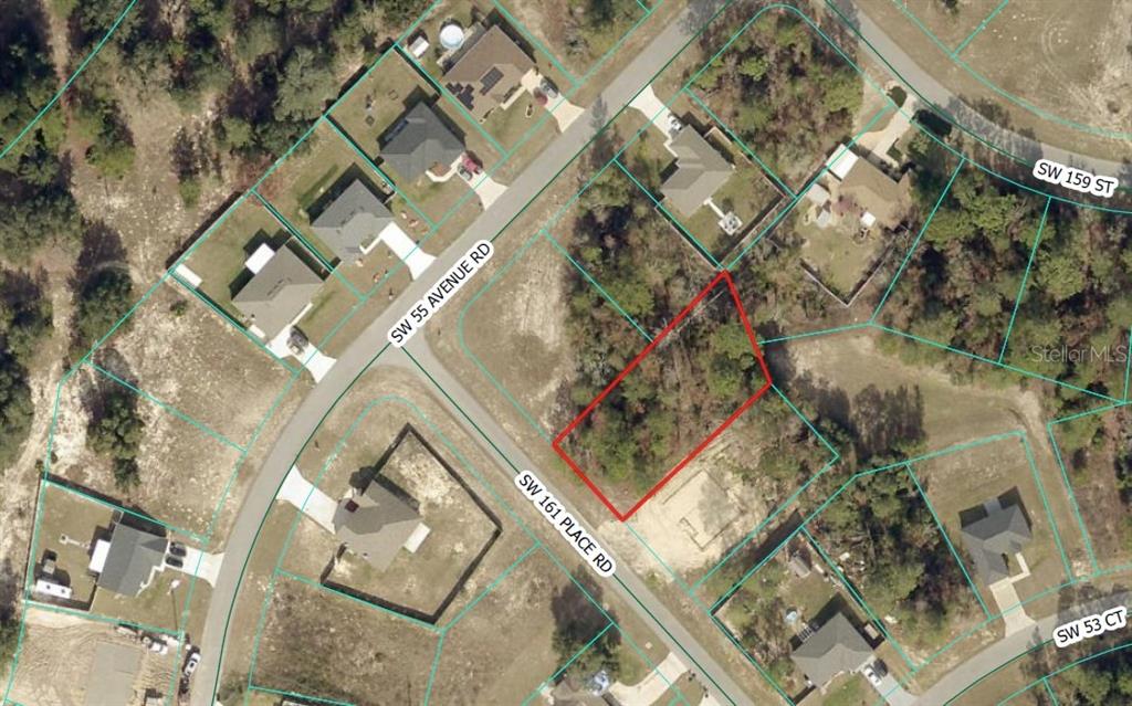 This is an aerial map showing a vacant, wooded residential lot outlined in red — 0 SW 161ST PLACE ROAD, OCALA, FL