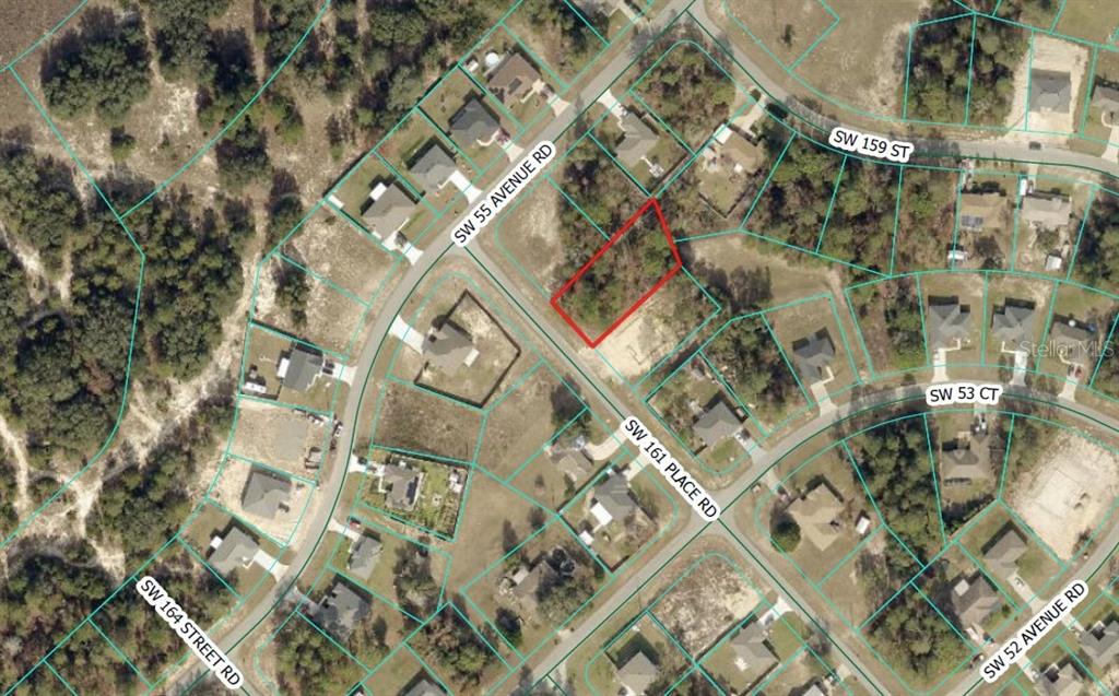 This is an aerial map showing a vacant residential lot outlined in red — 0 SW 161ST PLACE ROAD, OCALA, FL