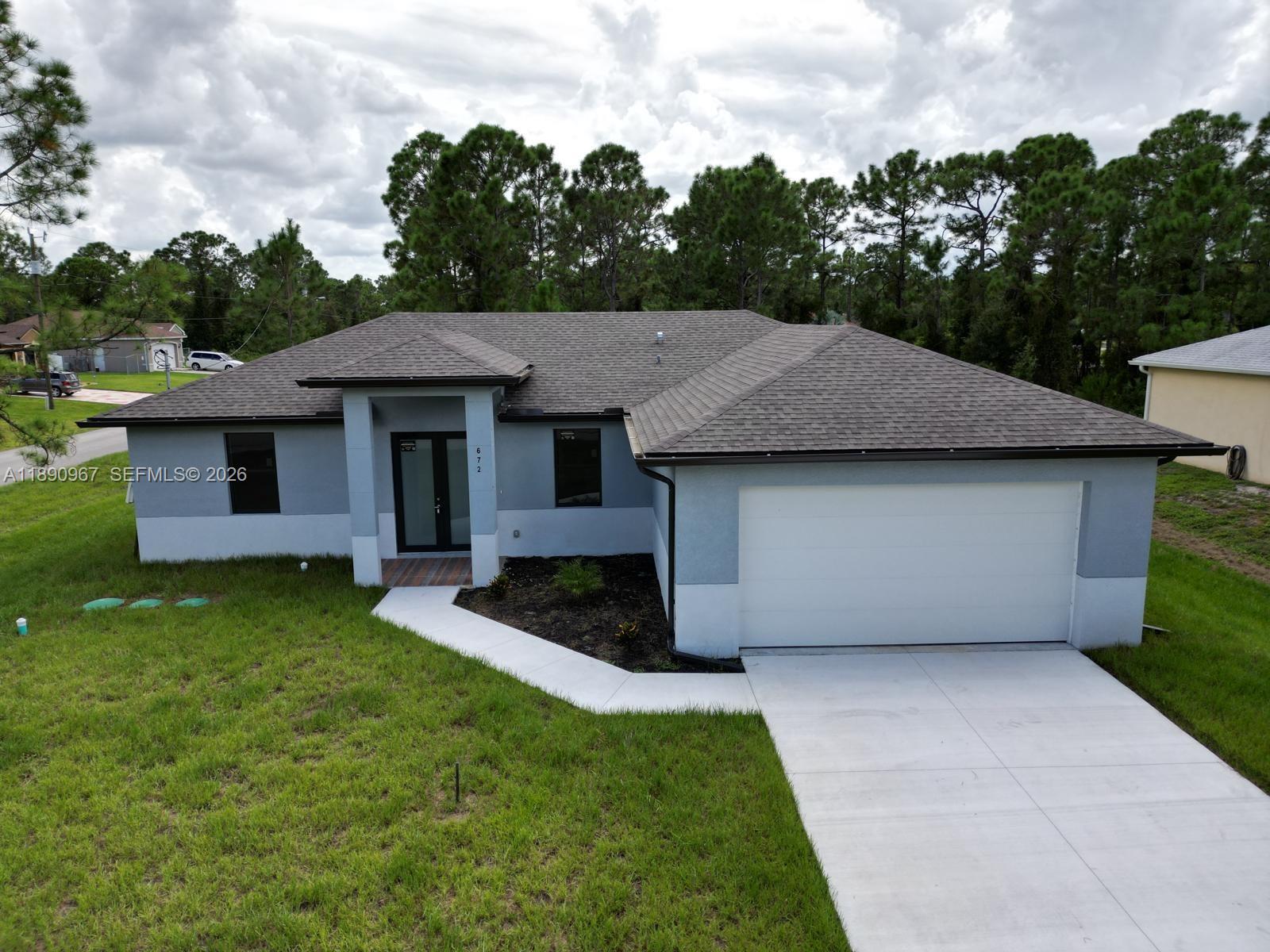 672 Nimitz BLVD, Lehigh Acres FL 33974