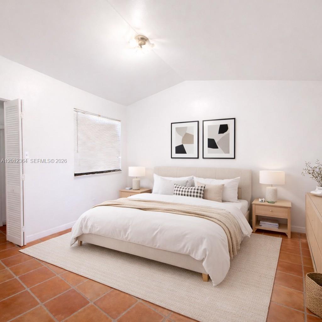 A small carpeted storage closet sits beside a staircase with decorative patterned risers — 1045 NW 126th Pl, Miami FL 33182, MIAMI, FL