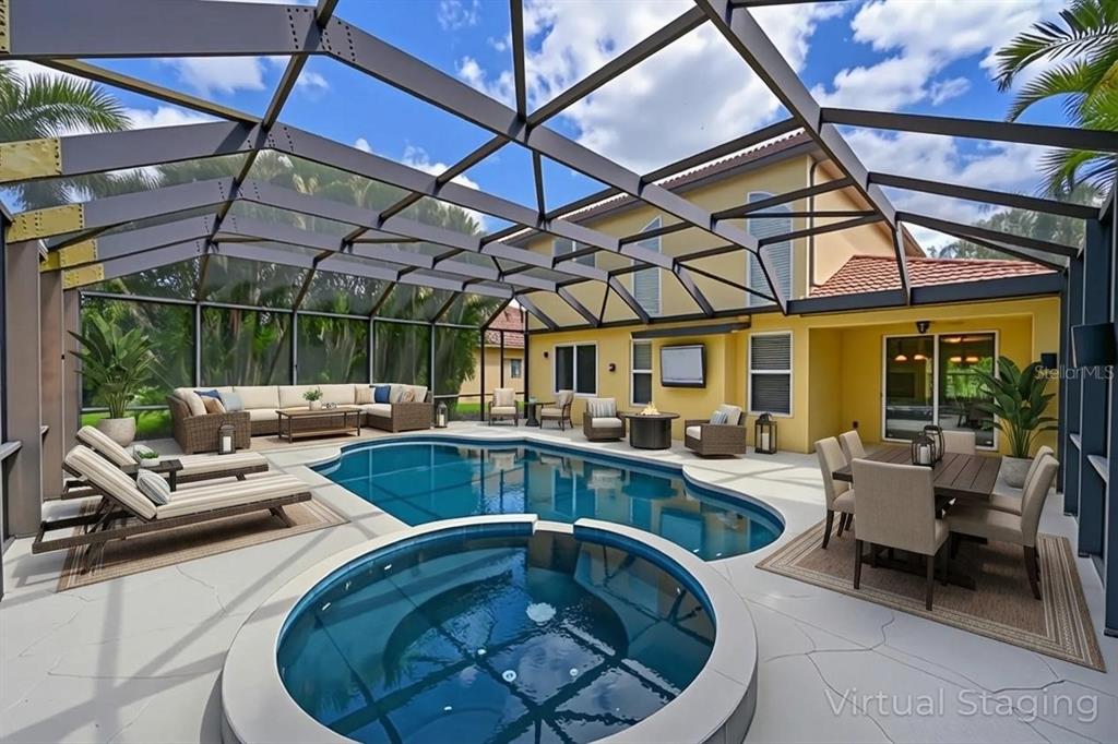 A screened-in patio features a swimming pool, a circular hot tub, and outdoor furniture — 210 WINDING RIVER TRAIL, BRADENTON, FL