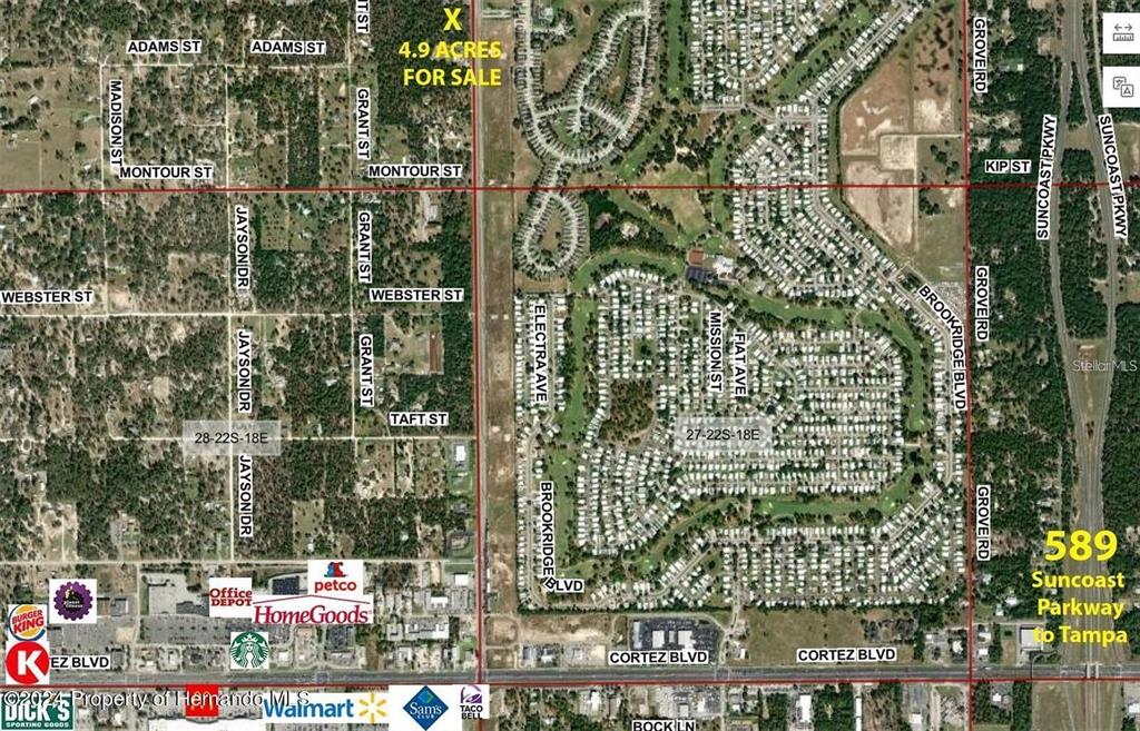 An aerial map shows a 4.9-acre plot of land for sale near commercial developments — SUNSHINE GROVE ROAD, BROOKSVILLE, FL