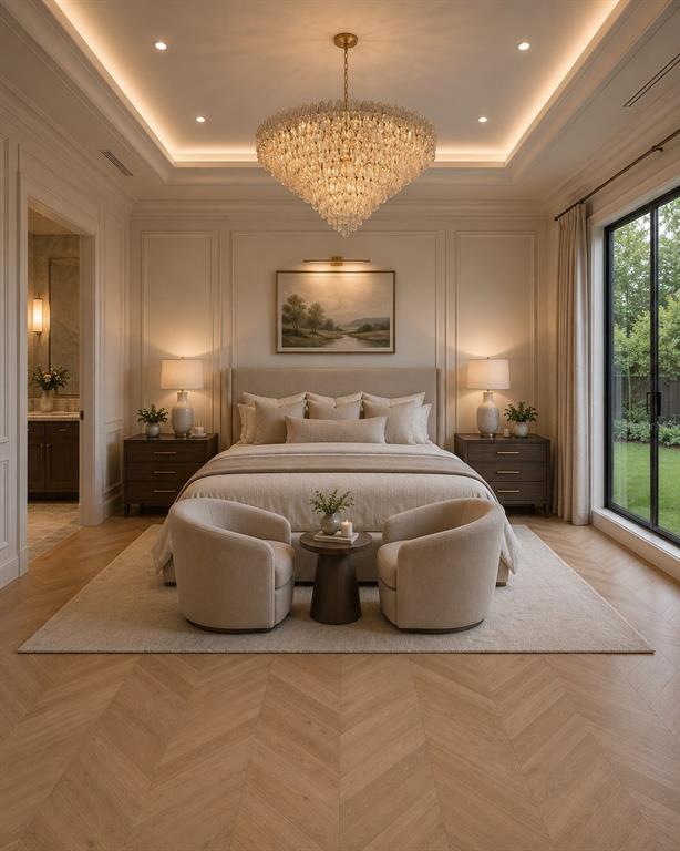 A bedroom features a crystal chandelier, herringbone wood floors, and two armchairs facing the bed — 620 VIRGINIA DRIVE, WINTER PARK, FL