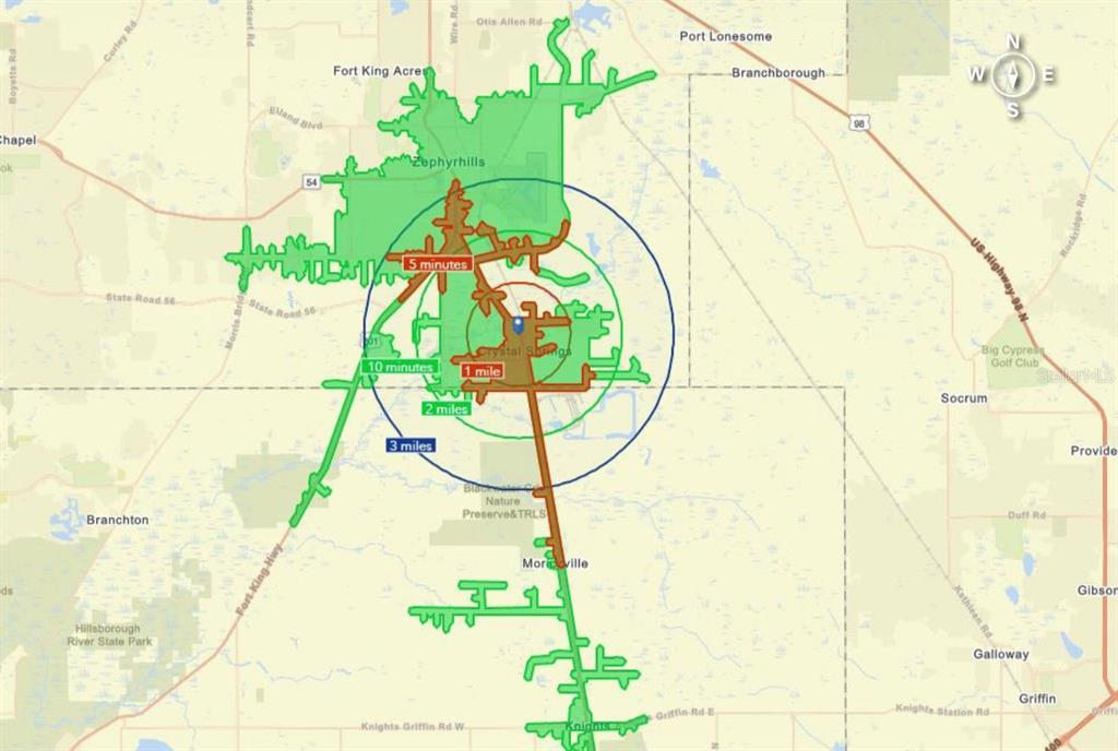 This map displays travel time and distance radii surrounding a central location in Zephyrhills, Florida — 0 FIG AVENUE, CRYSTAL SPRINGS, FL