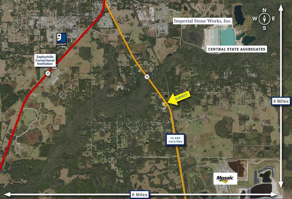 This aerial map shows the subject property location relative to nearby roads and industrial sites — 0 FIG AVENUE, CRYSTAL SPRINGS, FL
