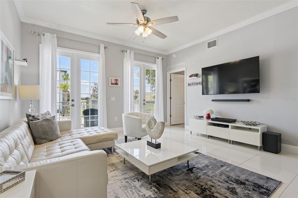 A bedroom features Zootopia-themed wall murals, bedding, and a ceiling painted like the sky — 7468 EXCITEMENT DRIVE UNIT 102, REUNION, FL