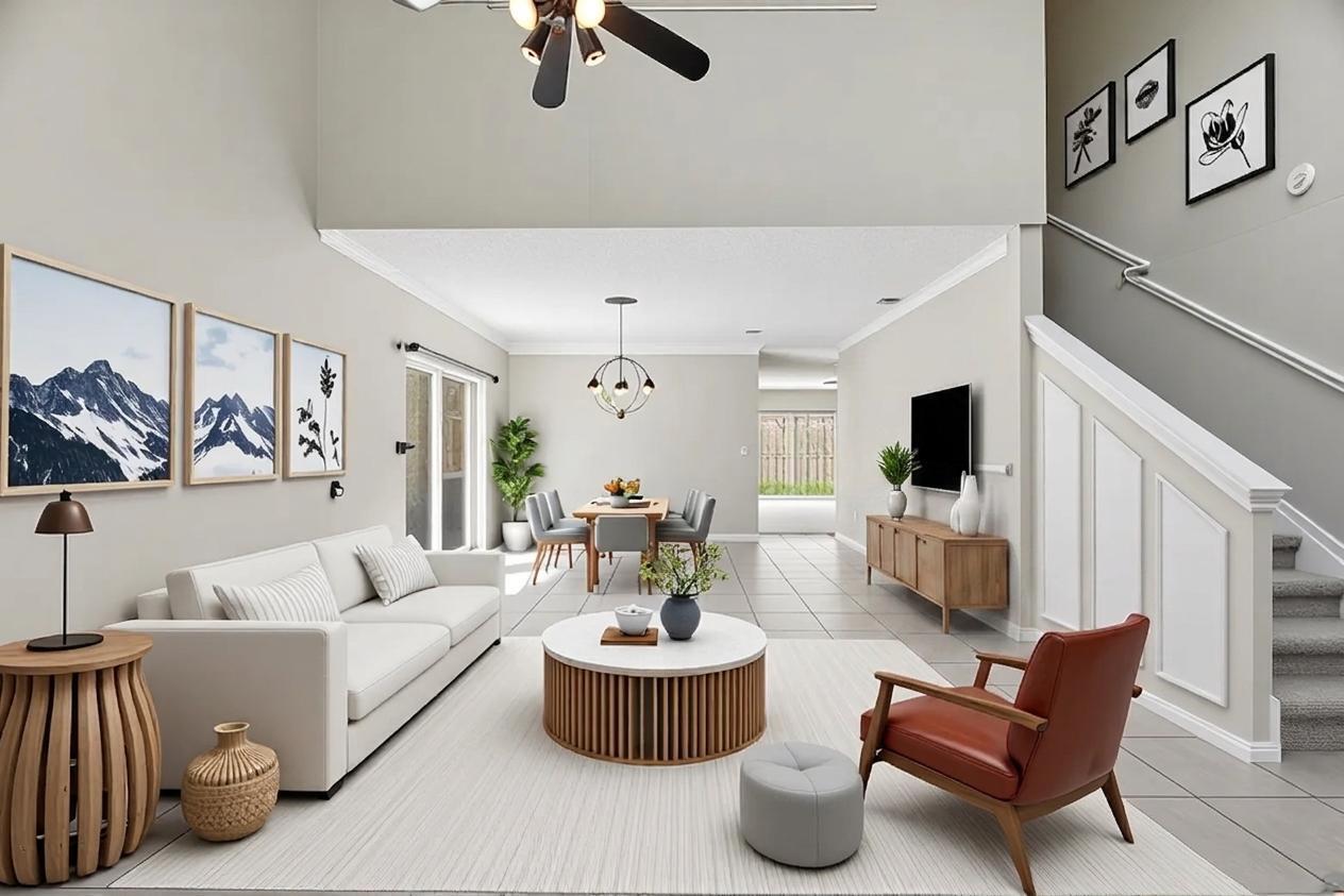 This is a digital rendering of an open-concept living and dining area with vaulted ceilings — 5477 NW 44th Way, Coconut Creek FL 33073, COCONUT CREEK, FL