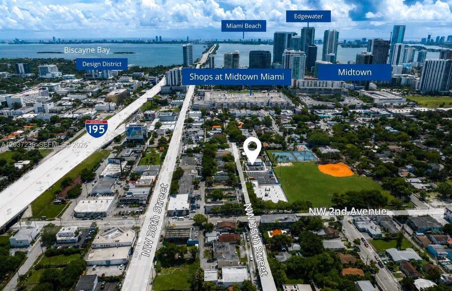 Aerial view of a city neighborhood with a marked property location and surrounding landmarks — 118 NW 35th St, Miami FL 33127, MIAMI, FL