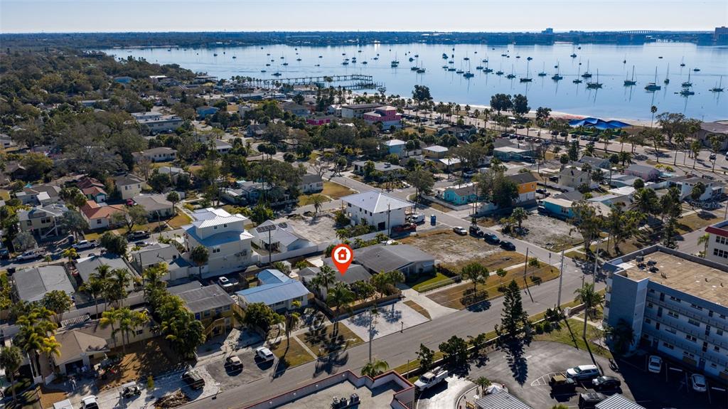 Aerial view of a coastal neighborhood with a house marked by a red location pin — 3038 58TH STREET S, GULFPORT, FL