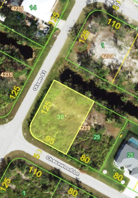 This is an aerial map showing a vacant corner lot at a street intersection — 14052 CHESSWOOD LANE, PORT CHARLOTTE, FL
