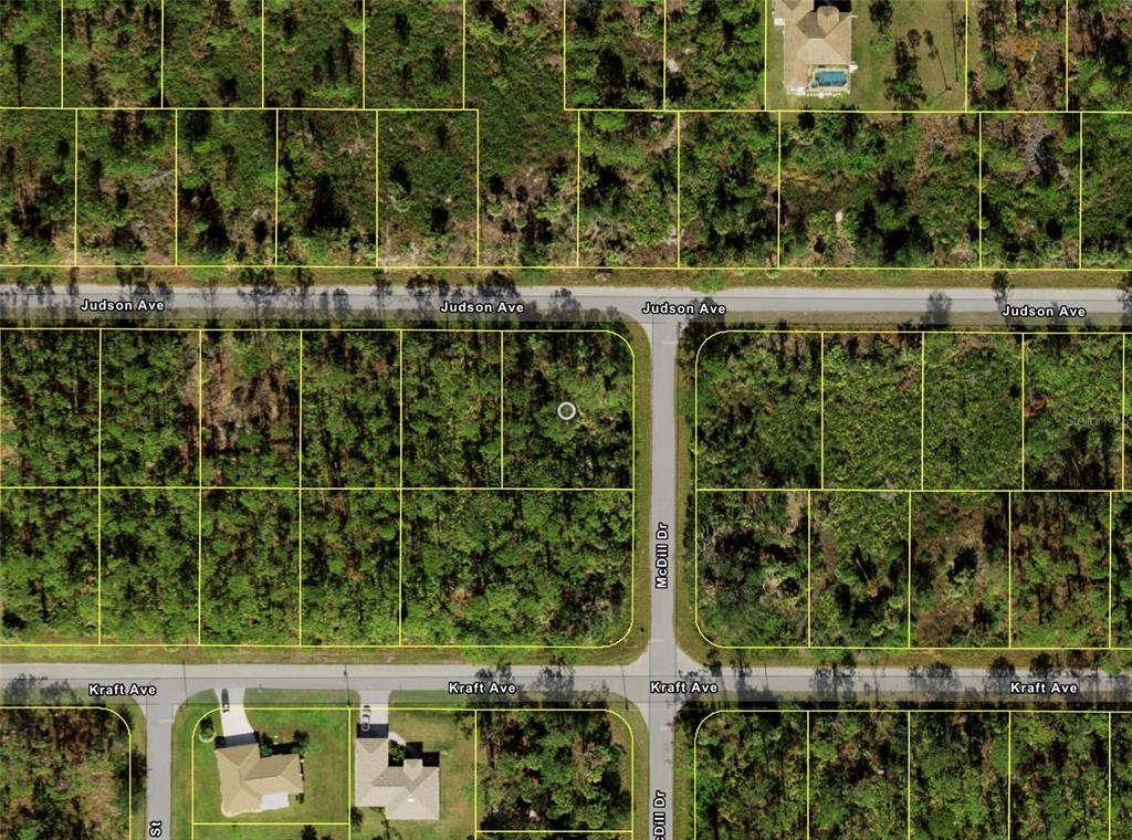 This is an aerial map showing undeveloped residential lots bordered by Judson Avenue and Kraft Avenue — 12107 JUDSON AVENUE, PORT CHARLOTTE, FL