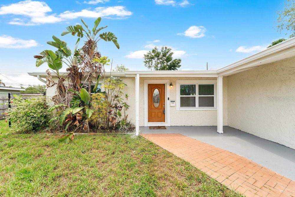 This is a floor plan for a single-story house with three bedrooms and a garage — 1920 64TH AVENUE N, ST PETERSBURG, FL