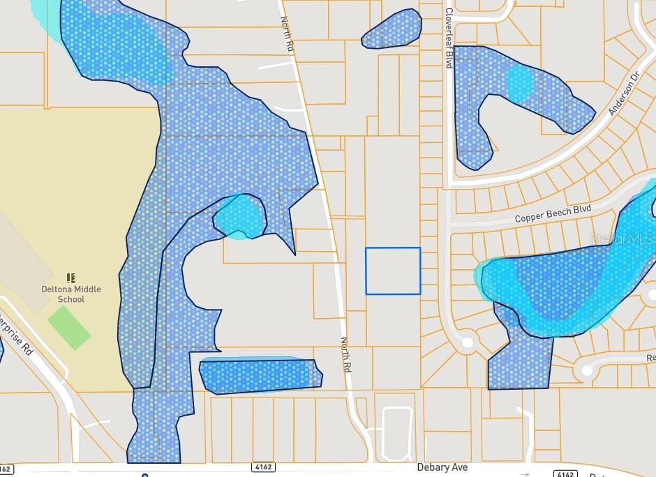 This map shows a rectangular property outlined in blue near a school and wetlands — NORTH ROAD, DELTONA, FL