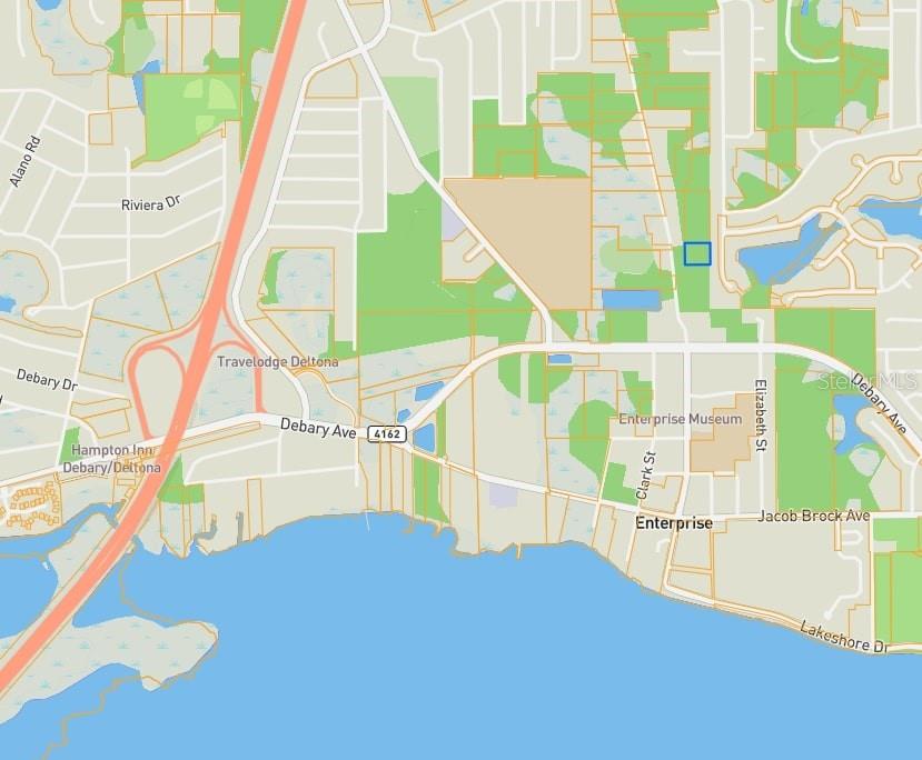 This is a map showing the area surrounding a property marked with a blue rectangle — NORTH ROAD, DELTONA, FL