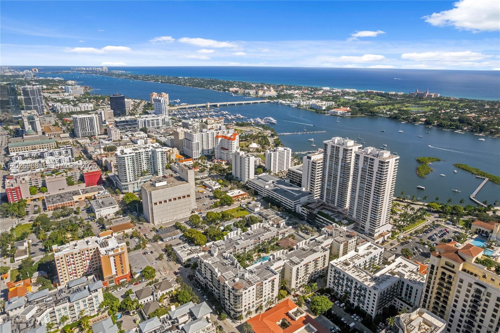 An aerial view shows a dense city skyline along a large body of water — 515 S Dixie Hwy, West Palm Beach FL 33401, WEST PALM BEACH, FL