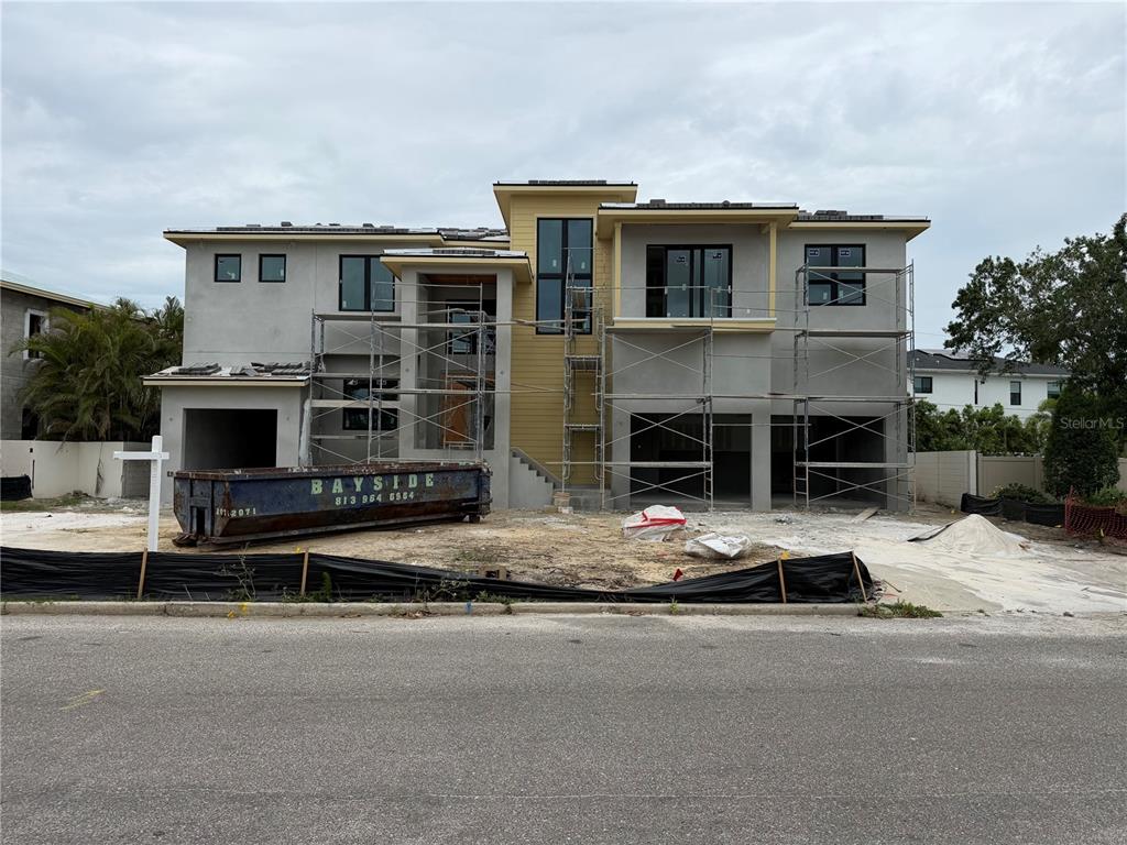 This is a floor plan showing a multi-car garage, living areas, and a bedroom — 626 DANUBE AVENUE, TAMPA, FL