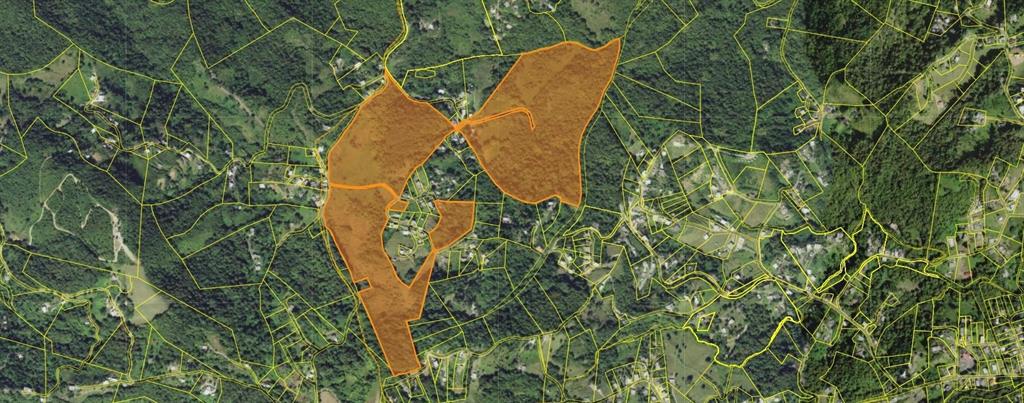 This is a map showing several highlighted land parcels over an aerial view of terrain — 87.29 cuerdas Bo.Quemados CARR 7788 KM HM 2.2, SAN LORENZO, PR