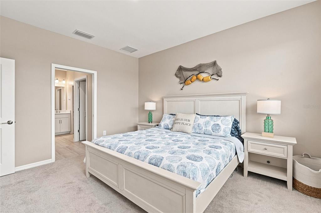 An aerial view shows a residential complex with multiple buildings, a pool, and surrounding ponds — 23819 COLLINA WAY UNIT 203, PORT CHARLOTTE, FL