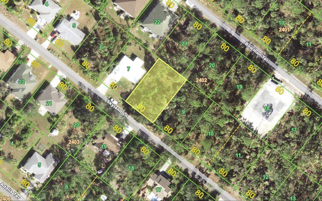 This is an aerial map showing a highlighted vacant lot along a residential street — 384 SKYLAND LANE, PORT CHARLOTTE, FL