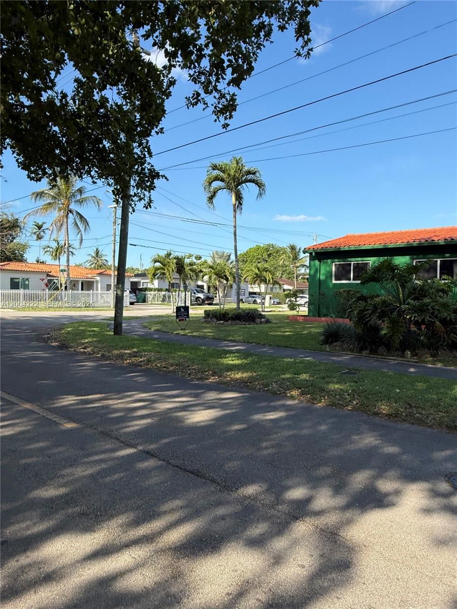 A street view shows a green house with a red tile roof and palm trees — 540 SW 39th Ave, Coral Gables FL 33134, CORAL GABLES, FL
