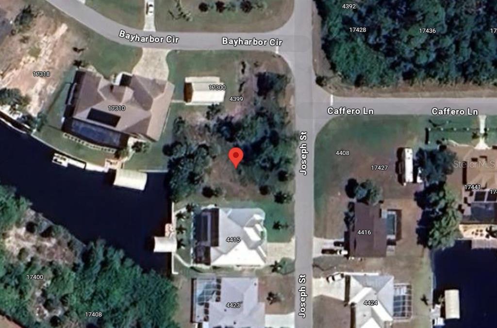 This is an aerial map showing a vacant lot marked with a pin near residential streets — 4407 JOSEPH STREET, PORT CHARLOTTE, FL