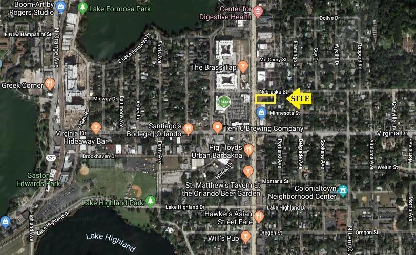 This is an aerial map showing a highlighted property site in a residential neighborhood — 1517 N MILLS AVENUE, ORLANDO, FL