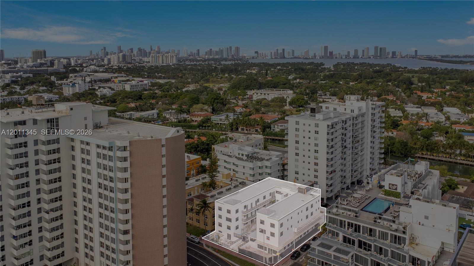 An aerial view shows a white multi-story apartment building highlighted in a white outline — 2814 Collins Ave, Miami Beach FL 33140, MIAMI BEACH, FL