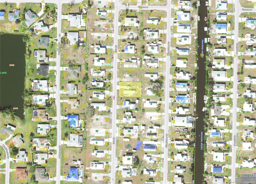 This is an aerial map showing residential lots and waterways in a suburban neighborhood — 1409 IBIS (LOT 20) DRIVE, ENGLEWOOD, FL