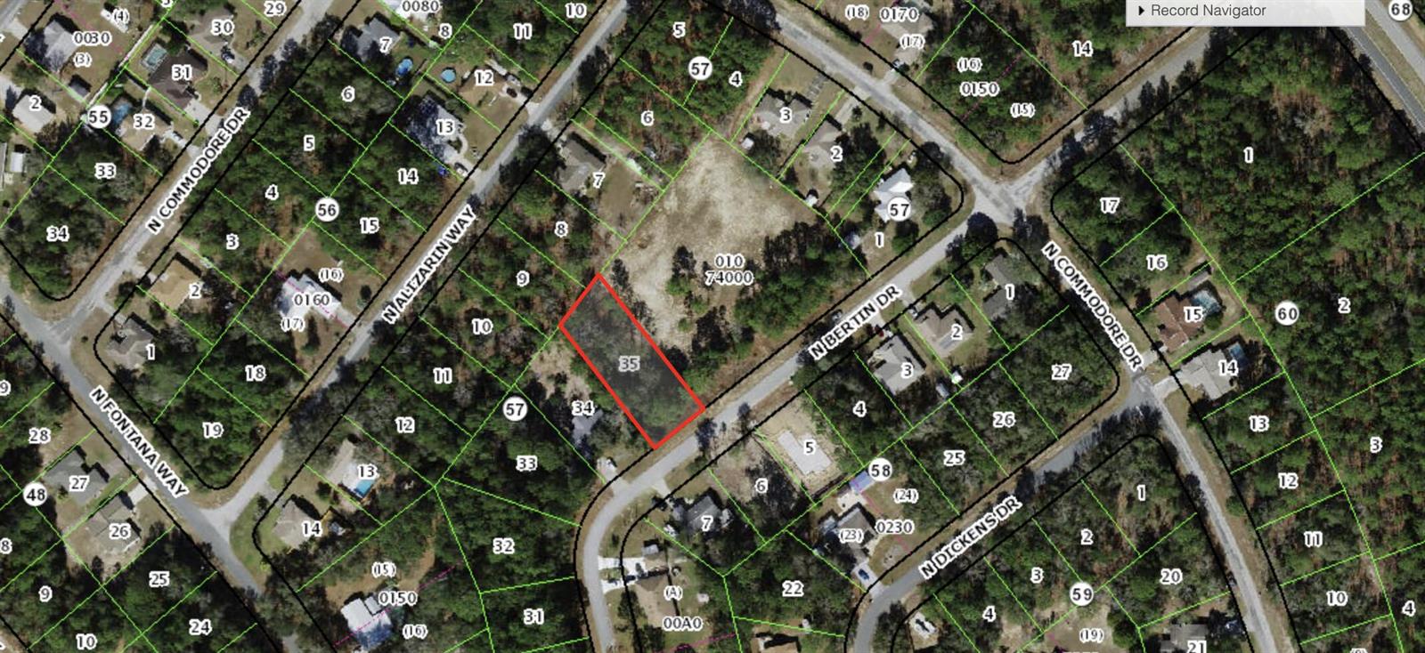 This is a satellite map showing a vacant, rectangular lot outlined in red — 9131 N Bertin Drive, FL 34434, FL