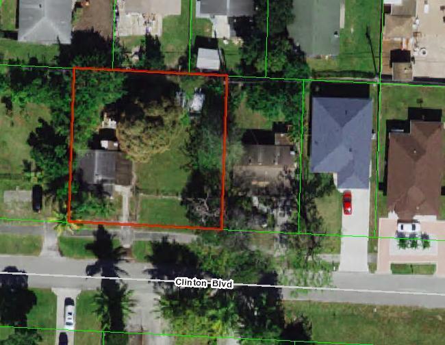 This is an aerial map view showing a residential lot outlined in red on Clinton Blvd — 4599 Clinton Boulevard, FL 33463, FL