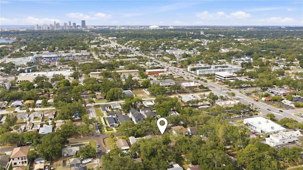 An aerial view shows a residential neighborhood with a location marker pointing to a lot — 331 43RD AVENUE N, ST PETERSBURG, FL