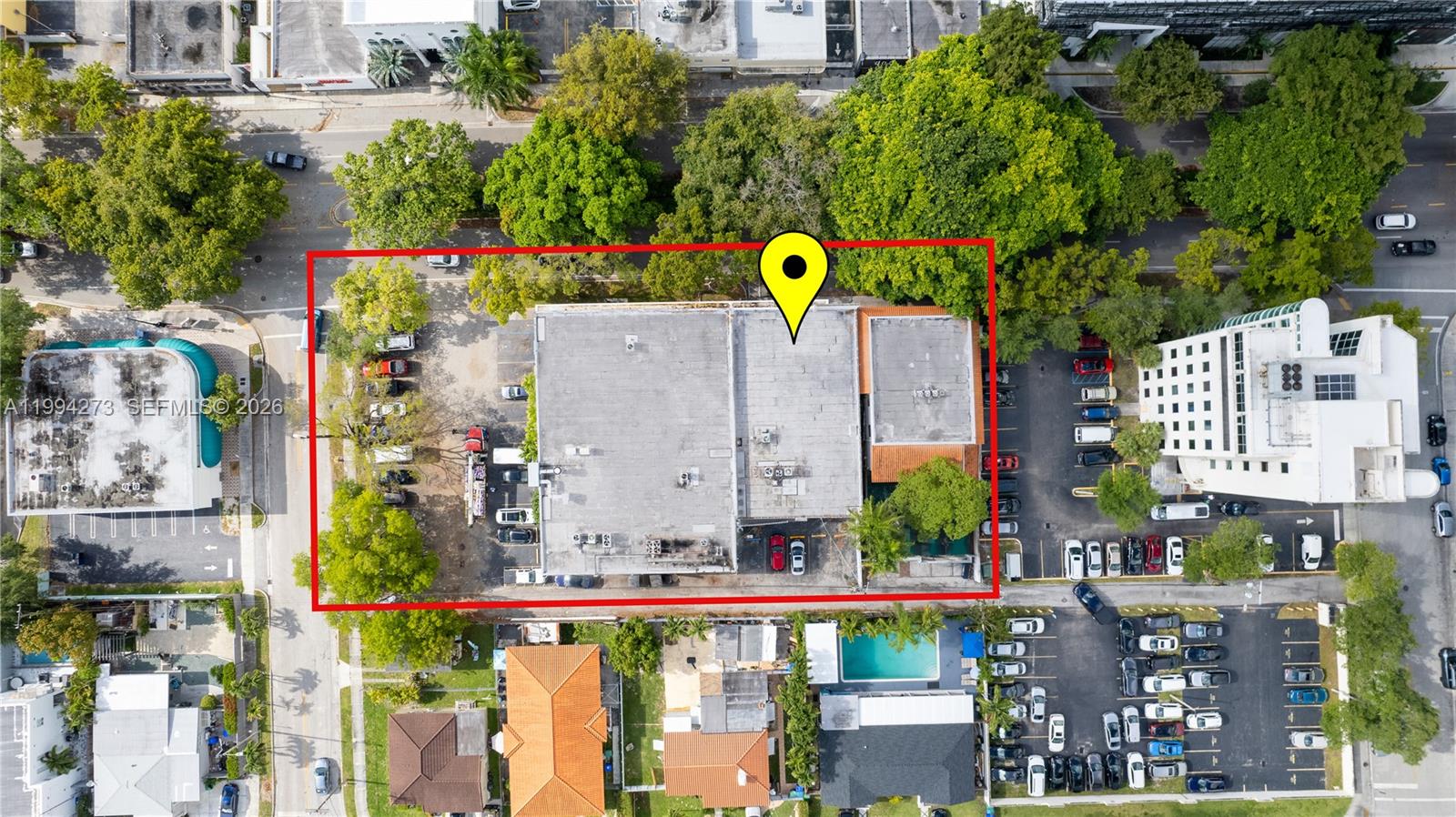 An aerial view shows a commercial building with a parking lot outlined in red — 3119 Coral Way # 200, Miami FL 33145, MIAMI, FL